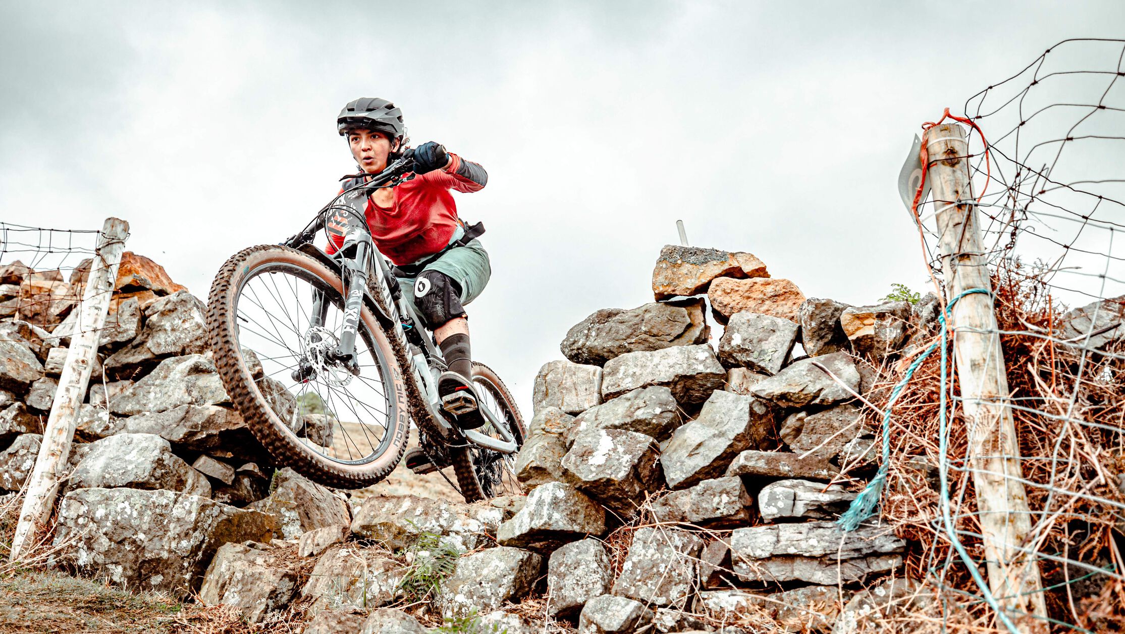When it comes to riding down features that scare you, start with a rollable version of it, practice it until your brain trusts your body to time things right and then go try the actual feature. 