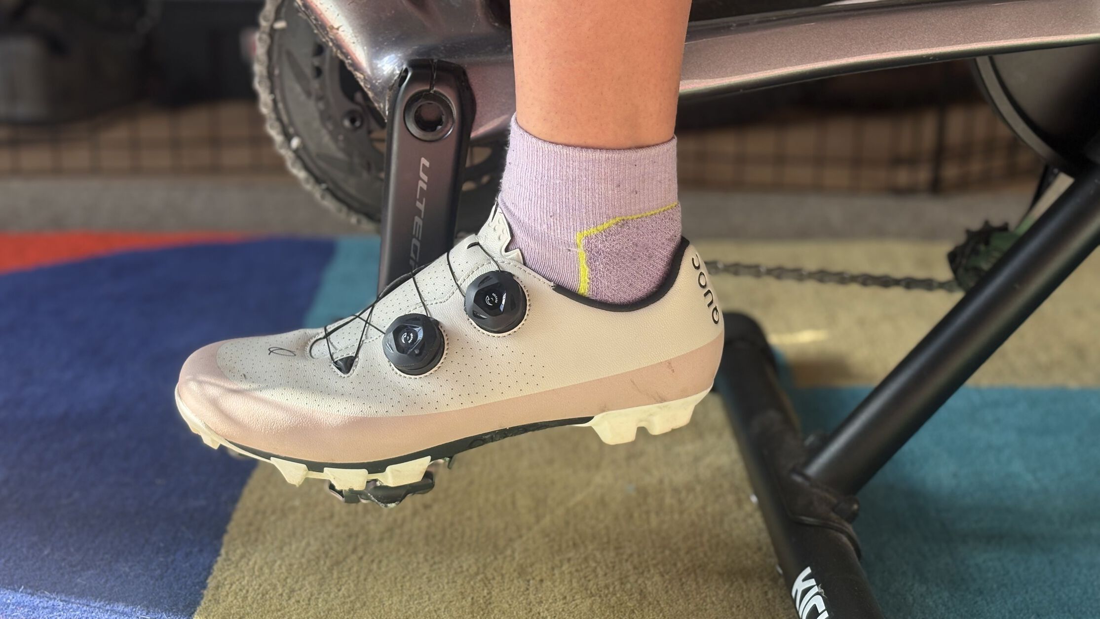 Cleats should sit directly under the ball of your foot. 